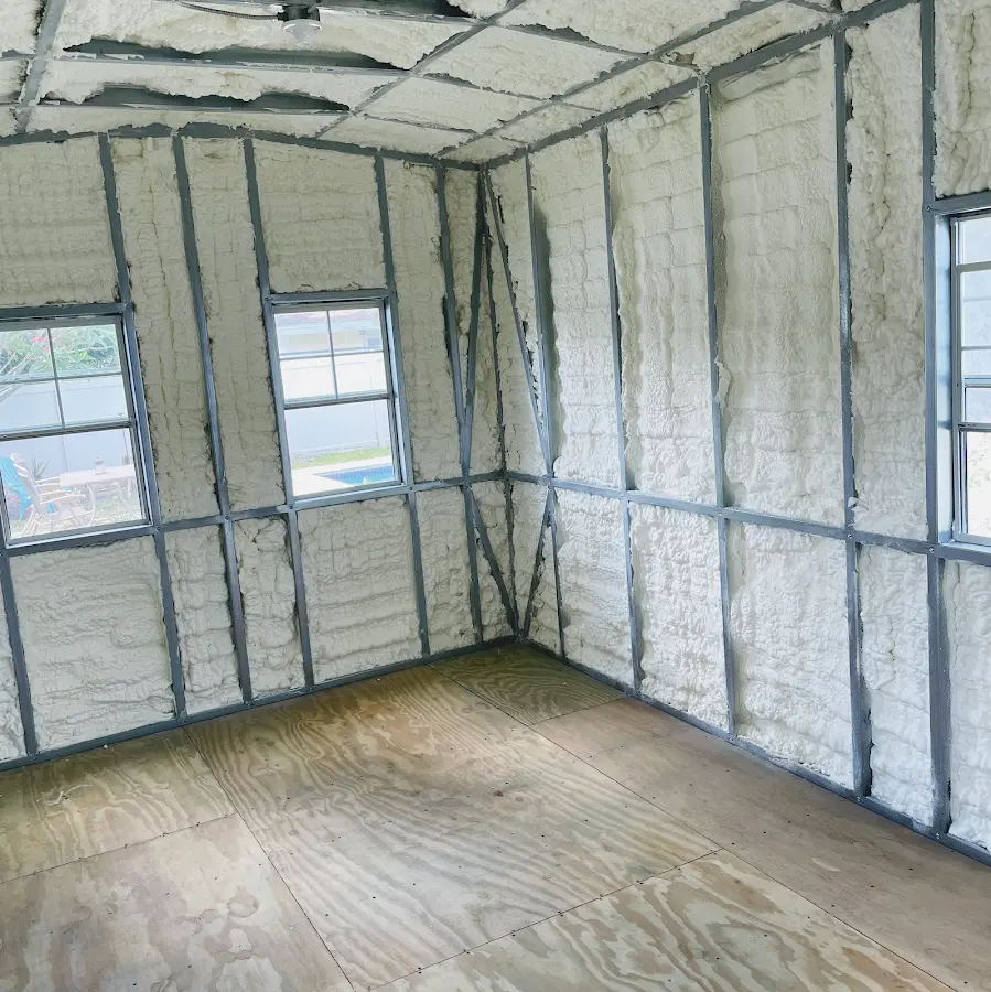 Closed-cell spray foam insulation applied to wall cavities in a residential project in Broadview Park